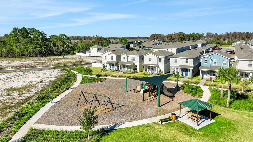 13013 Serene Glade Road Winter Garden, FL 34787 - Photo 41 of 57 a view of a swimming pool and lounge chairs