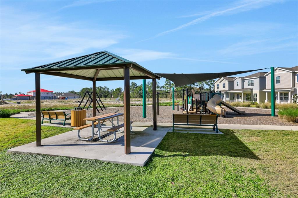 13013 Serene Glade Road Winter Garden, FL 34787 - Photo 52 of 57 a view of a house with backyard and porch