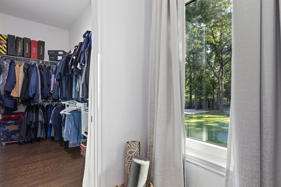 153 Fawn Hollow Elgin, TX 78621 - Photo 23 of 40 Spacious closet featuring dark wood-type flooring