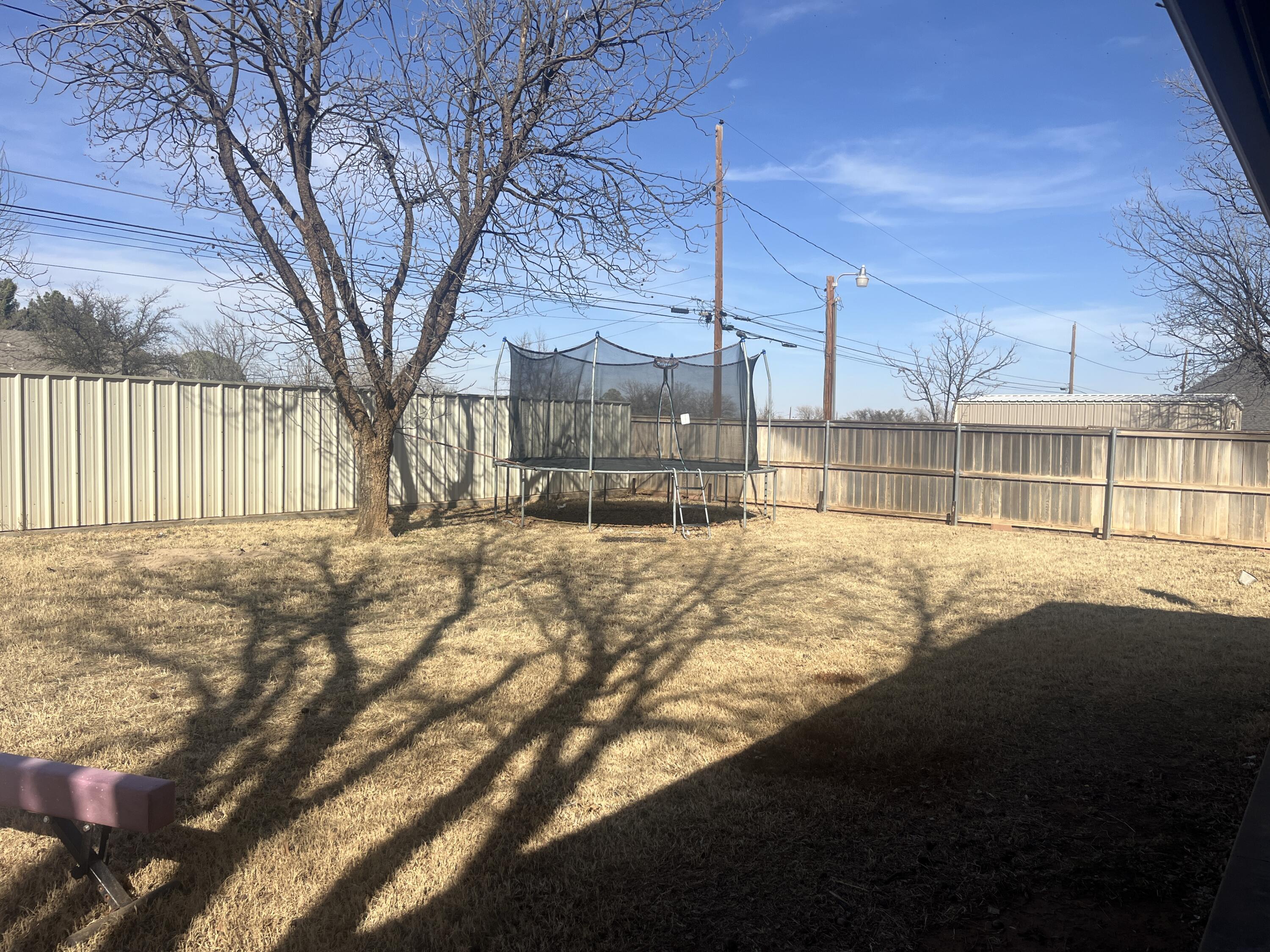 2222 South 2nd Place Lamesa, TX 79331 - Photo 36 of 44 a view of a house with a snow in the yard