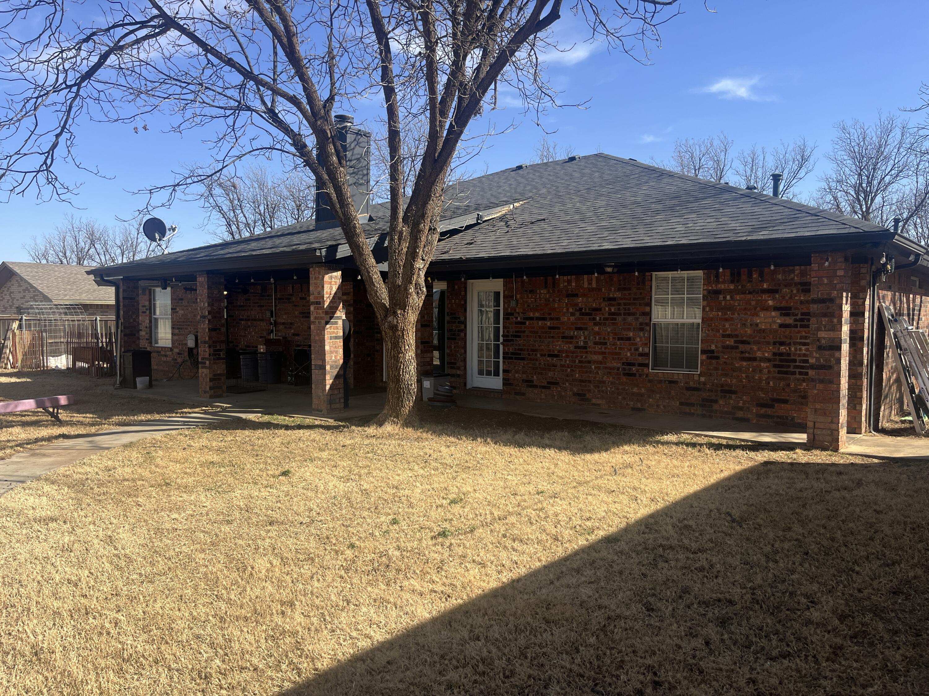 2222 South 2nd Place Lamesa, TX 79331 - Photo 40 of 44 a front view of a house with a yard