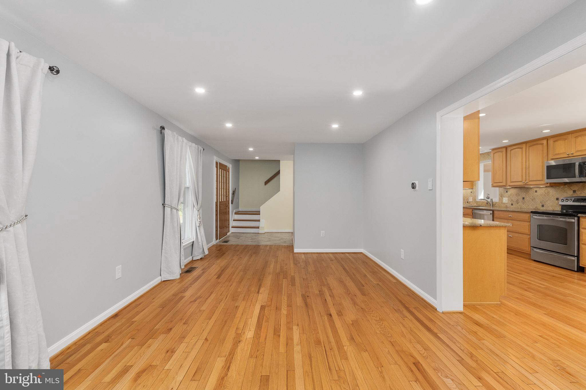 10802 Oldfield Drive Reston, VA 20191 - Photo 11 of 61 Front Family Room to Foyer