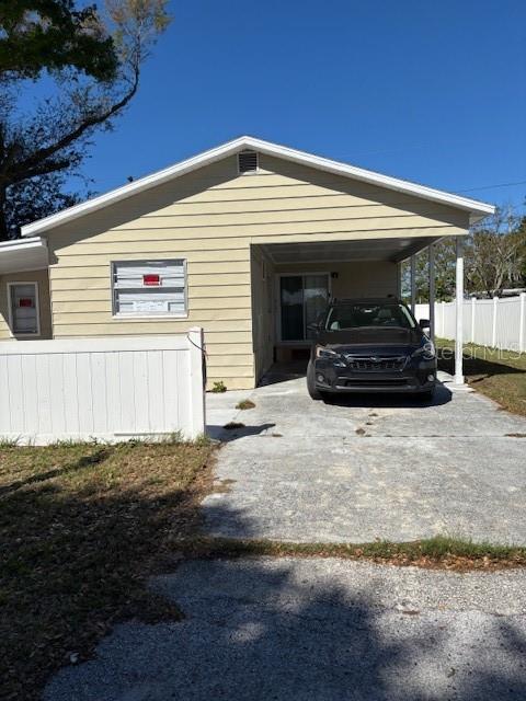 9145 Rally Lane Holiday, FL 34690 - Photo 2 of 14 a front view of a house