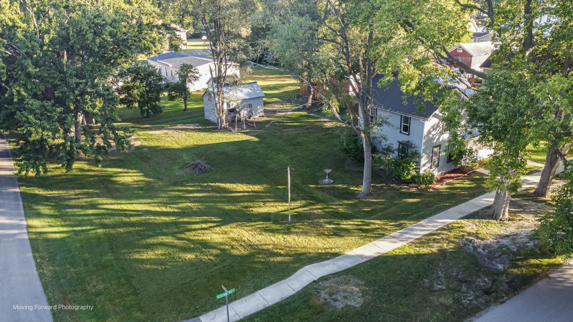208 West Sycamore Street Millington, IL 60537 - Photo 12 of 19 a view of a house with a yard