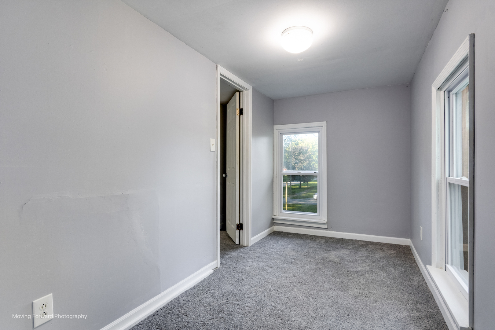 208 West Sycamore Street Millington, IL 60537 - Photo 13 of 19 an empty room with windows