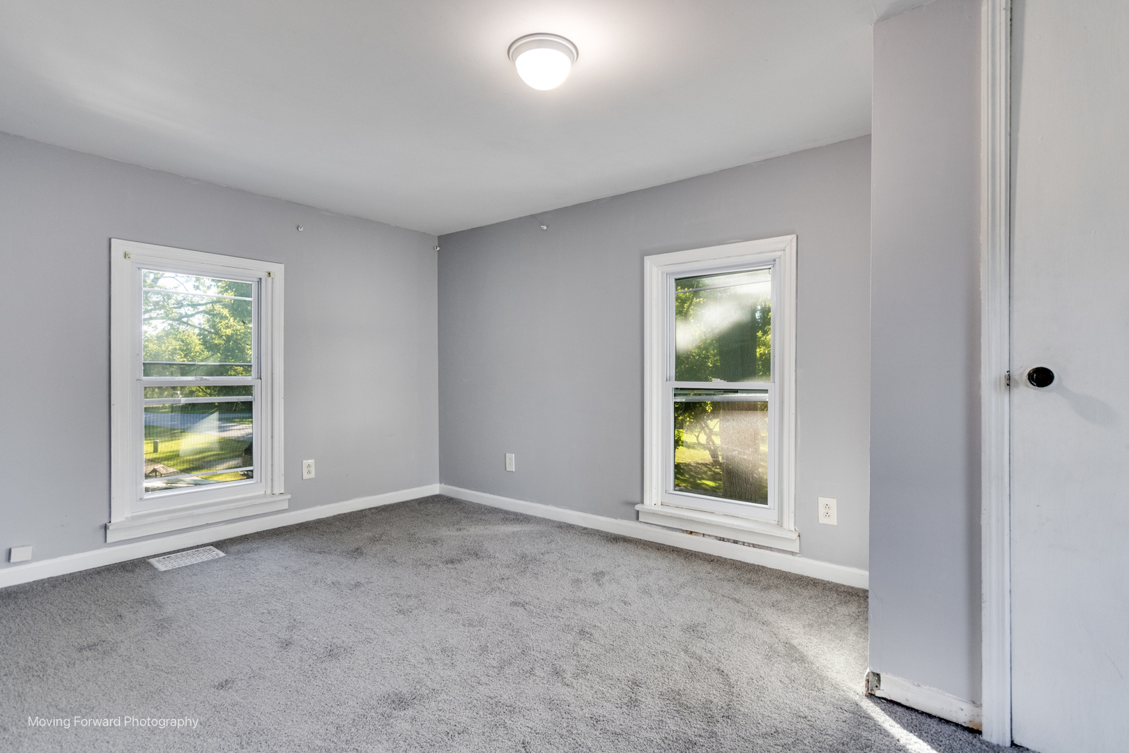 208 West Sycamore Street Millington, IL 60537 - Photo 14 of 19 an empty room with windows and closet