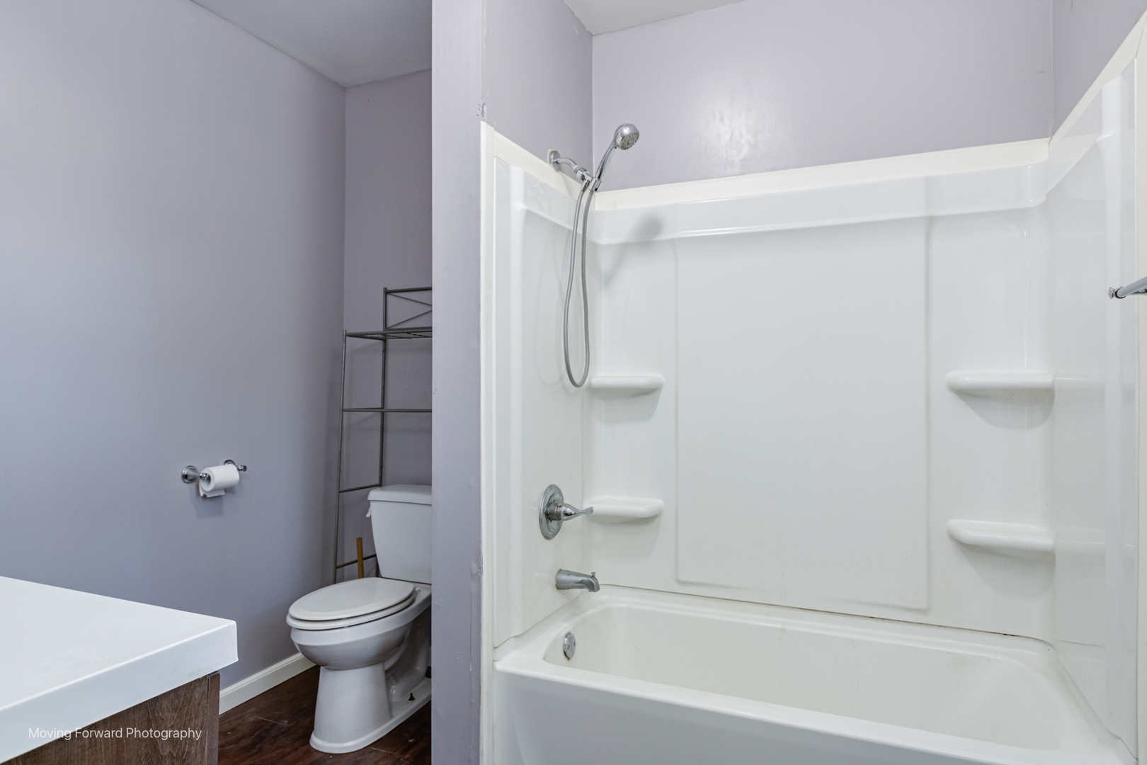 208 West Sycamore Street Millington, IL 60537 - Photo 8 of 19 a bathroom with a toilet and a bathtub