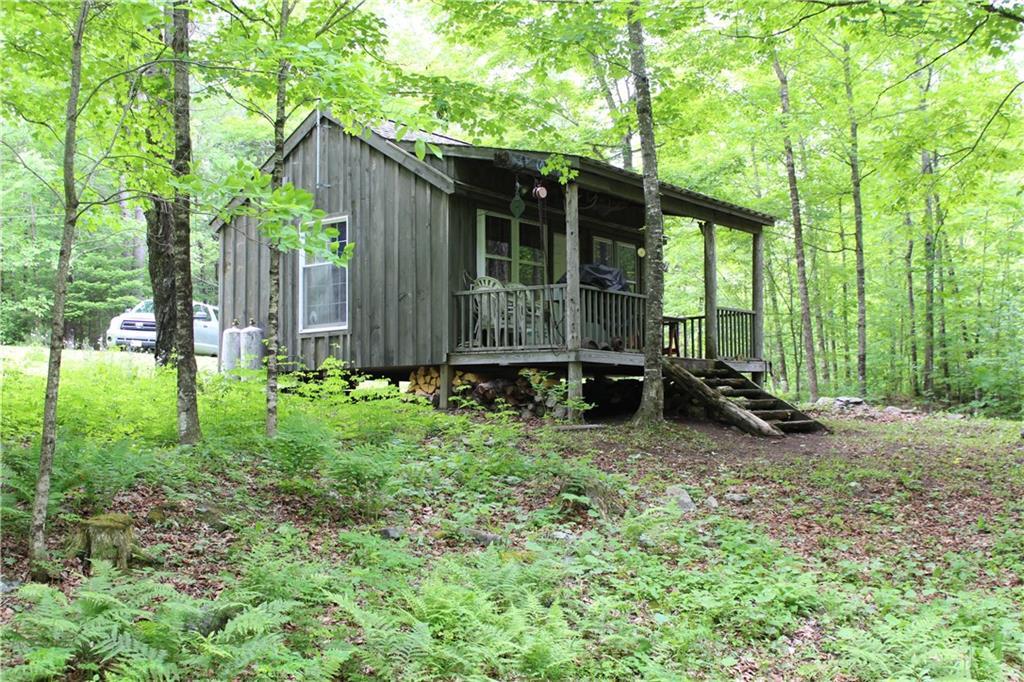 1 York Mill Athens, ME 04912 - Photo 3 of 23 Stream side view of camp with nice...