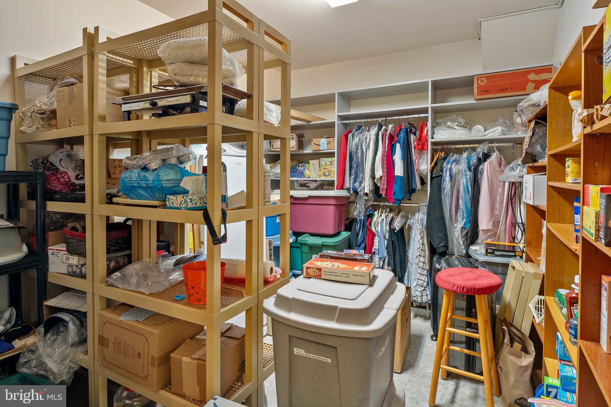 7305 Maplecrest Road, Unit 402 Elkridge, MD 21075 - Photo 25 of 55 a view of walk in closet with clothes