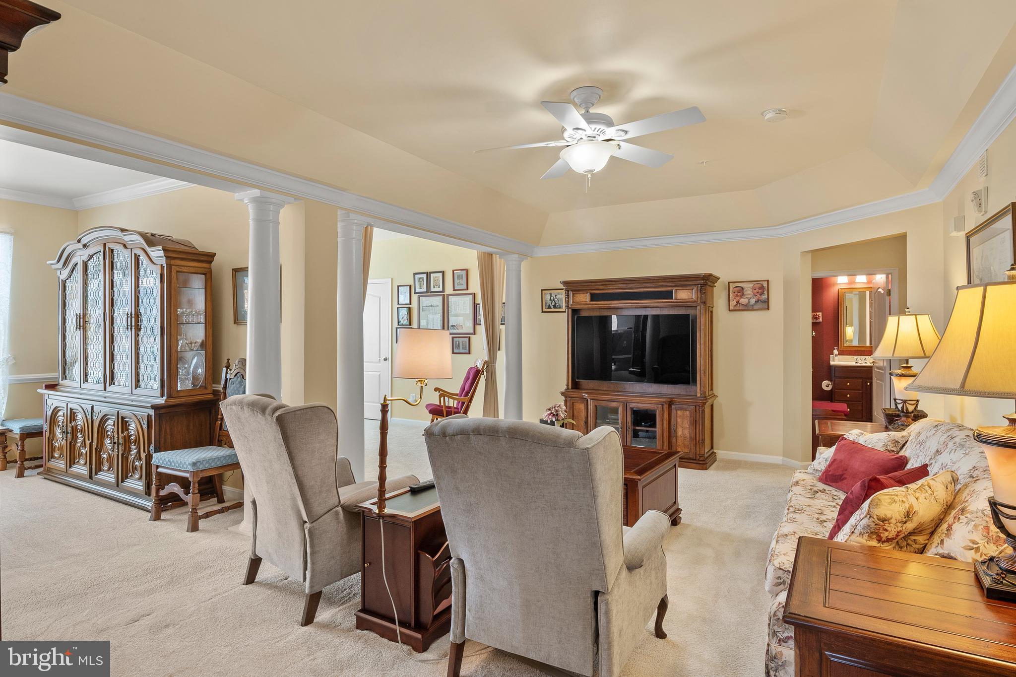 7305 Maplecrest Road, Unit 402 Elkridge, MD 21075 - Photo 7 of 55 a living room with furniture and a flat screen tv