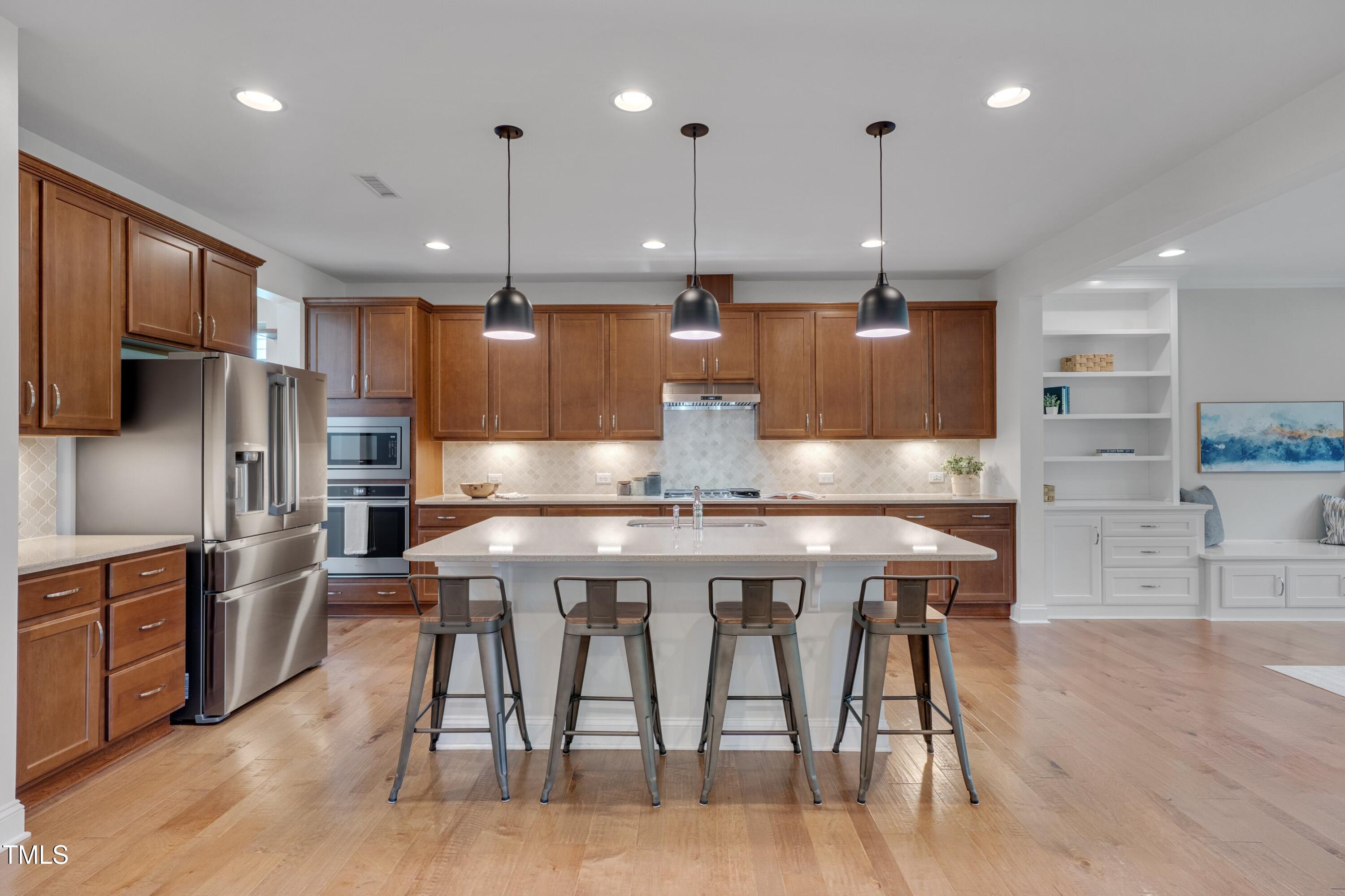1680 Mint River Drive Apex, NC 27502 - Photo 10 of 47 Large kitchen island with Quartz tops