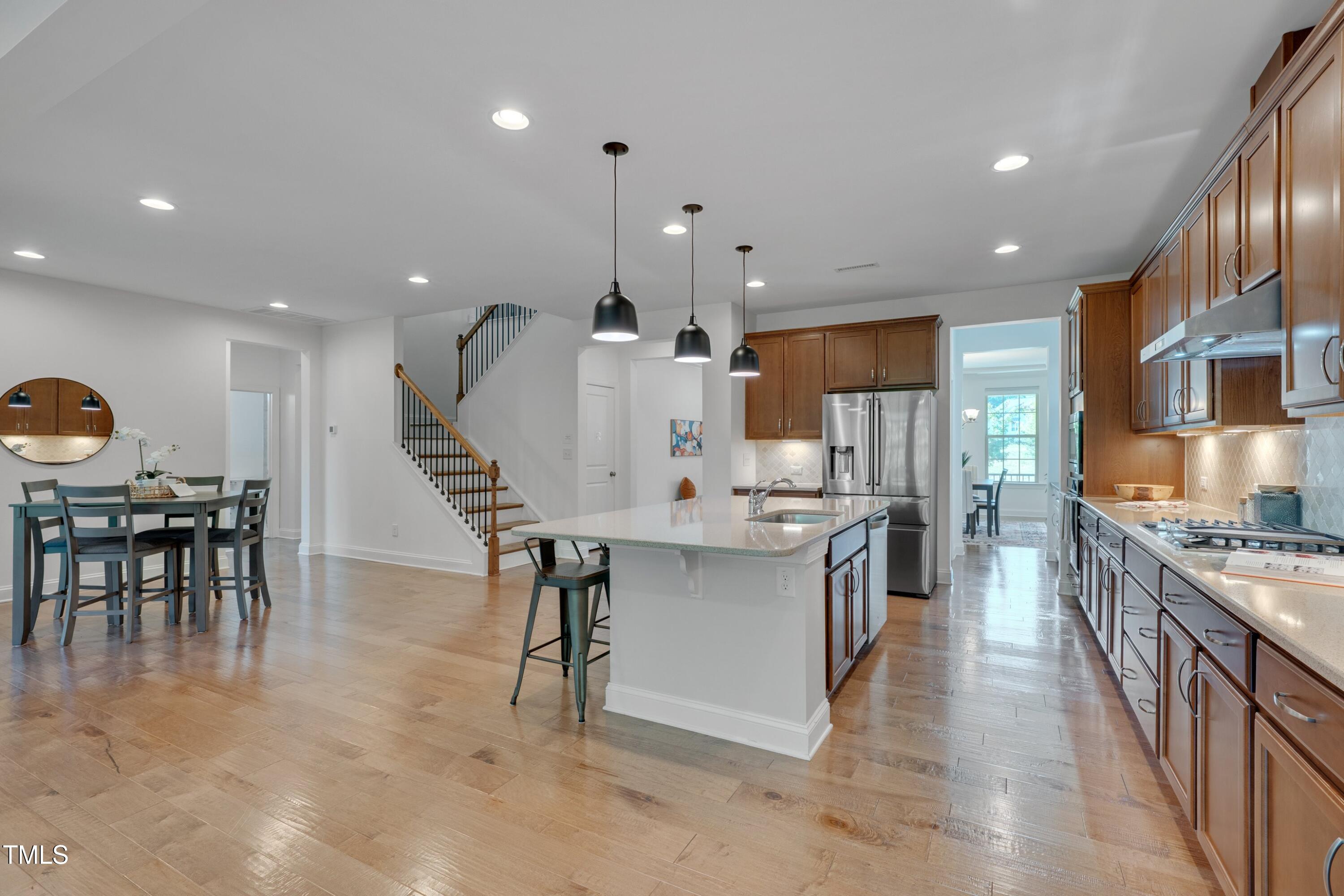 1680 Mint River Drive Apex, NC 27502 - Photo 16 of 47 Kitchen from living toom