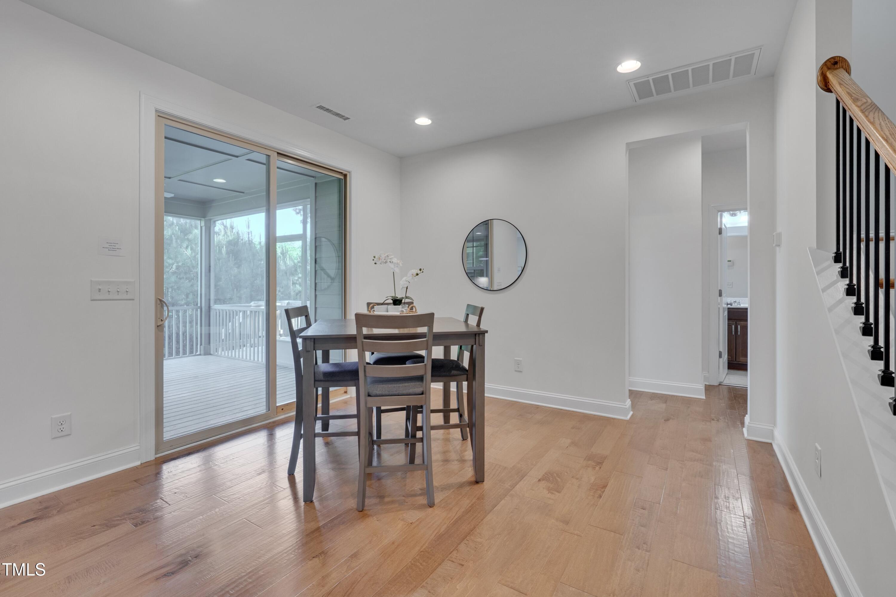 1680 Mint River Drive Apex, NC 27502 - Photo 18 of 47 Breakfast area adjacent to screen porch