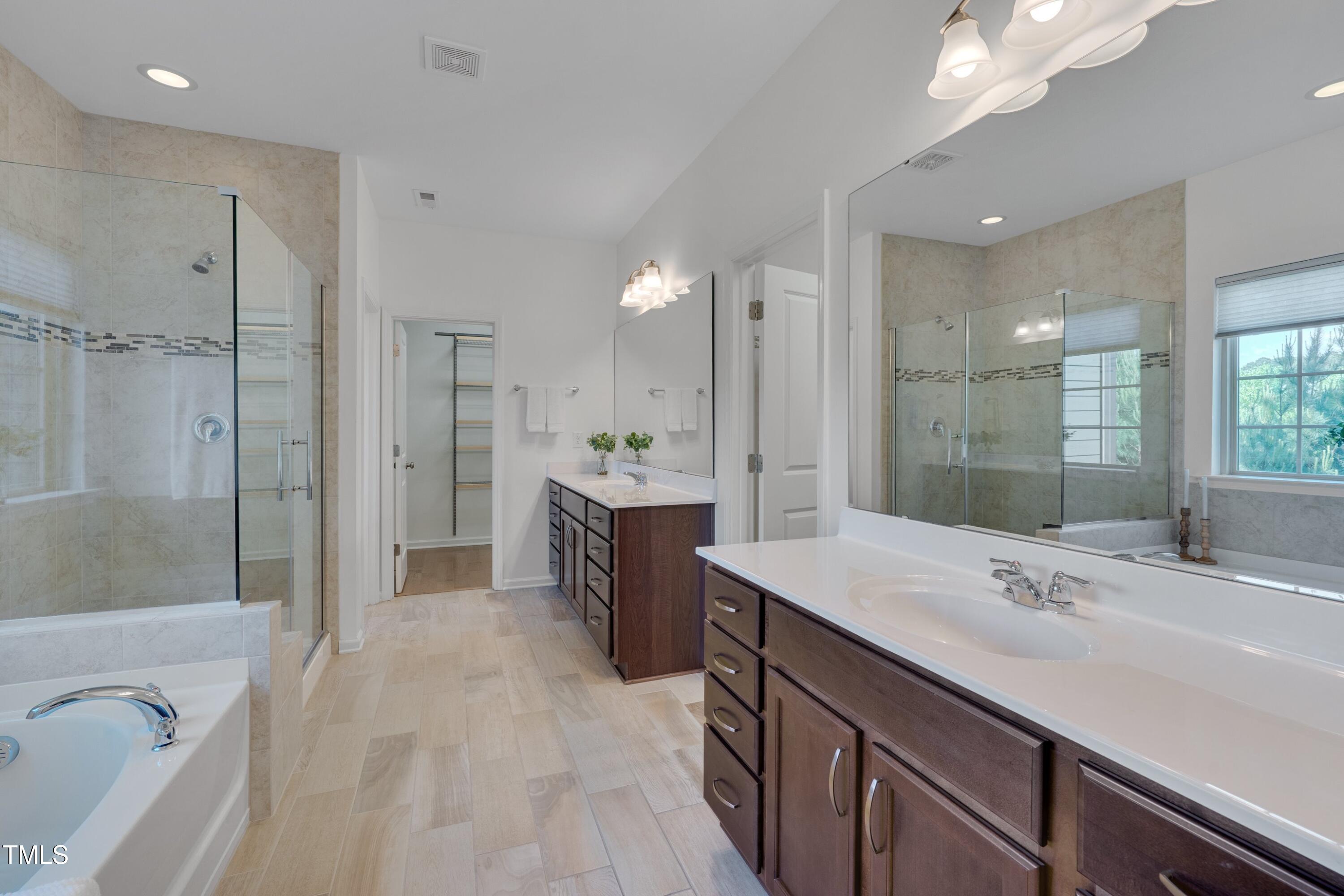 1680 Mint River Drive Apex, NC 27502 - Photo 27 of 47 Primary Bathroom