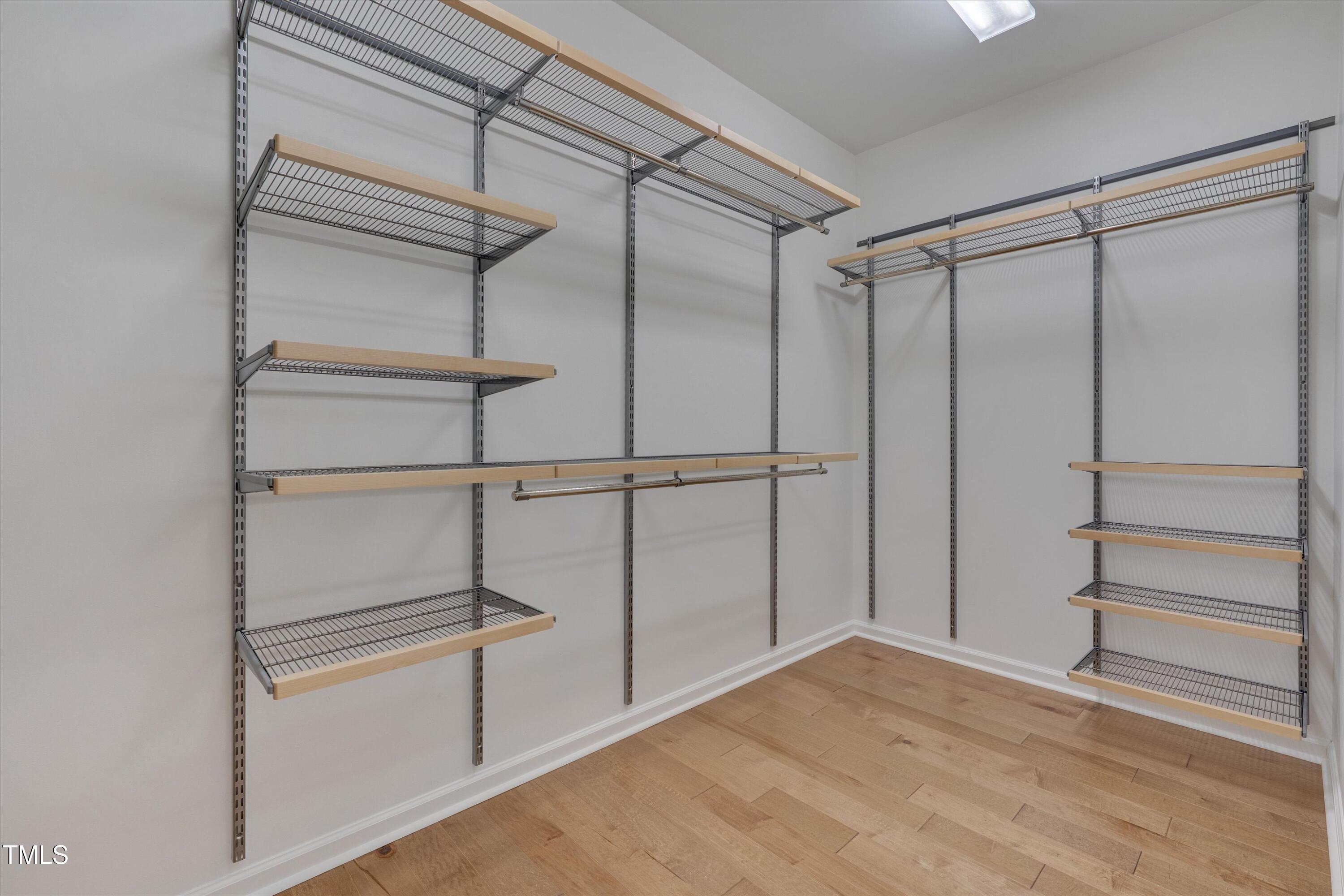 1680 Mint River Drive Apex, NC 27502 - Photo 29 of 47 Walk-in closet primary bedroom suite