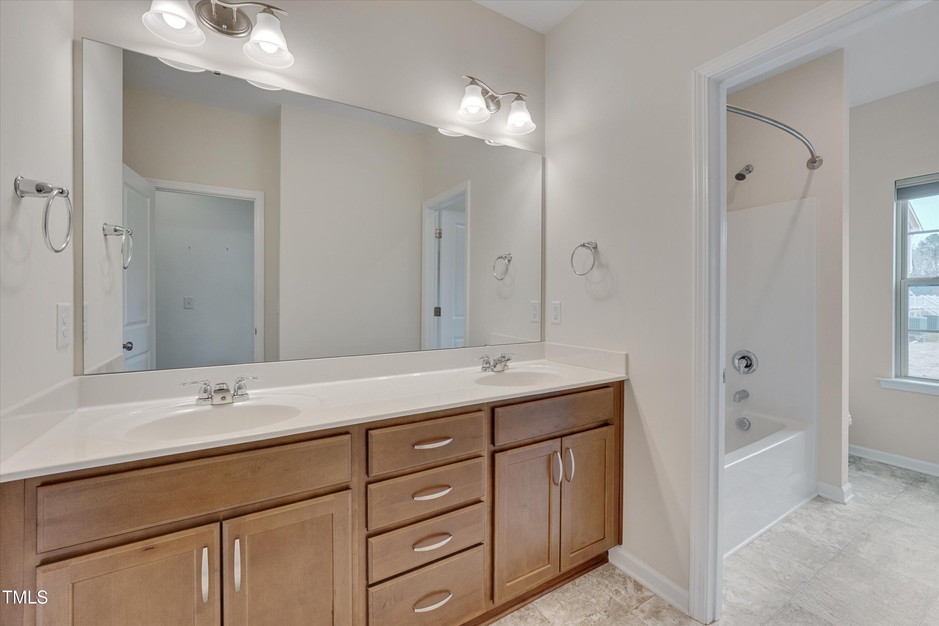 1680 Mint River Drive Apex, NC 27502 - Photo 31 of 47 Dual vanities in secondary bath