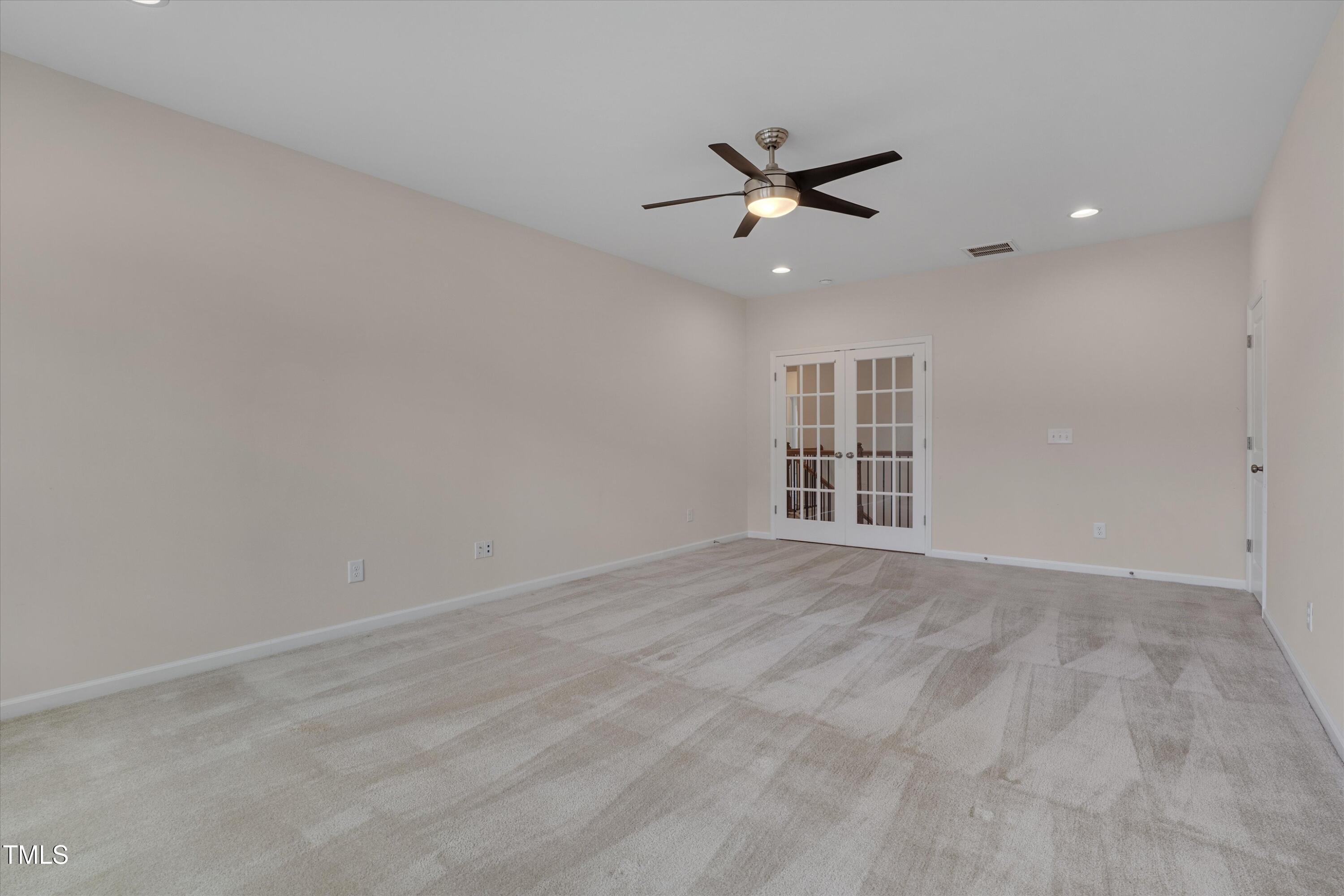 1680 Mint River Drive Apex, NC 27502 - Photo 34 of 47 Bonus room w/ glass French doors