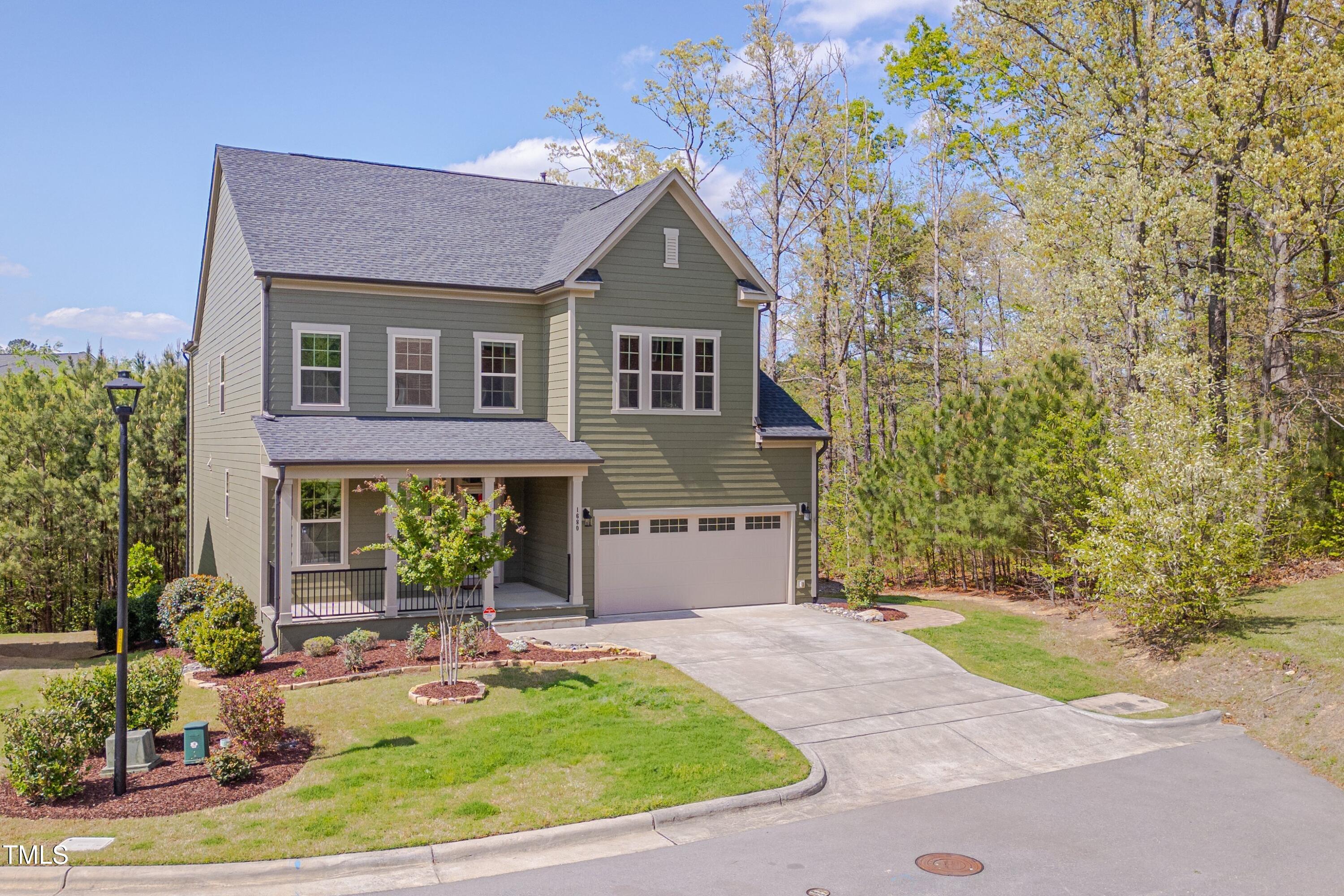 1680 Mint River Drive Apex, NC 27502 - Photo 4 of 47 Established Landscaping