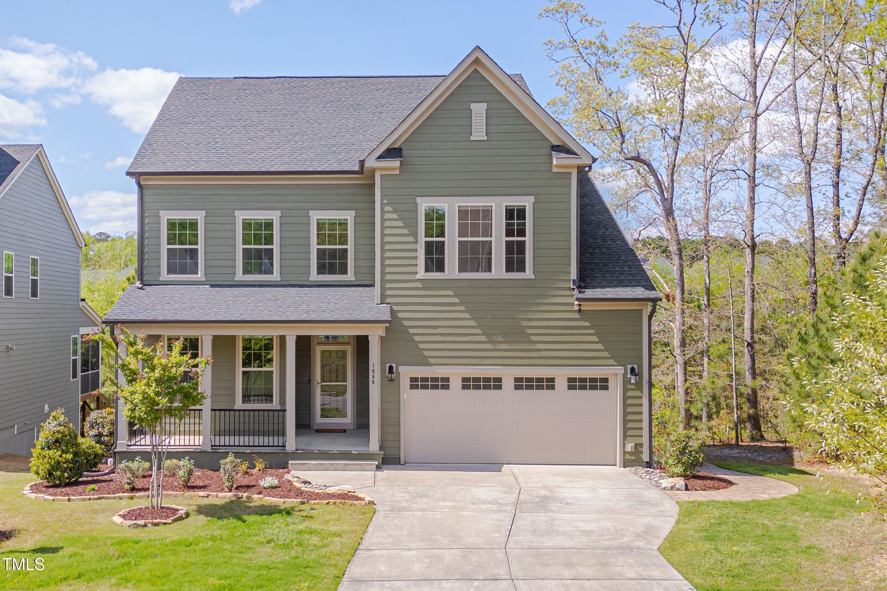 1680 Mint River Drive Apex, NC 27502 - Photo 5 of 47 Exterior Painted in 2024