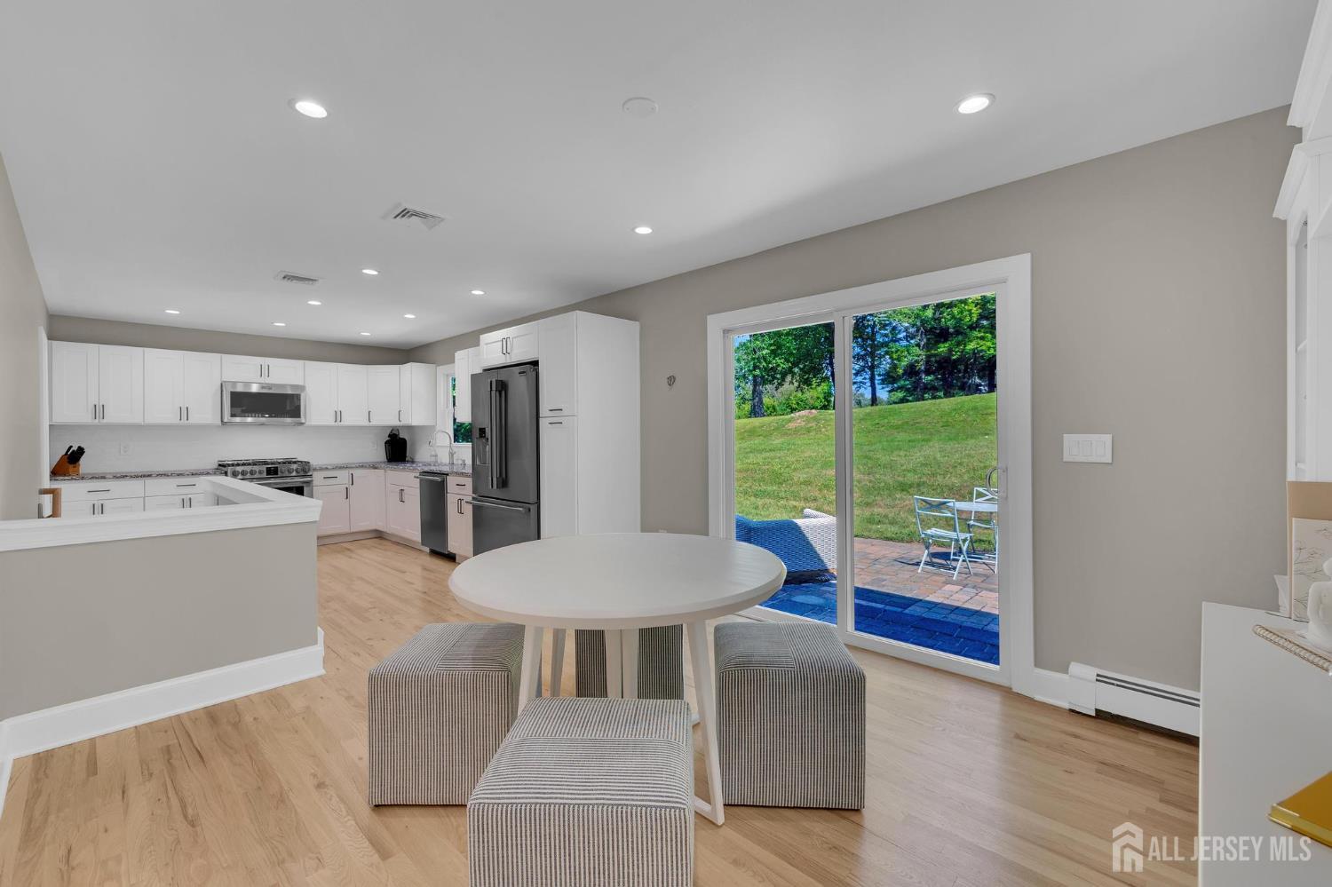 205 Hockenbury Road Hillsborough, NJ 08844 - Photo 12 of 38 a living room with furniture and a large window