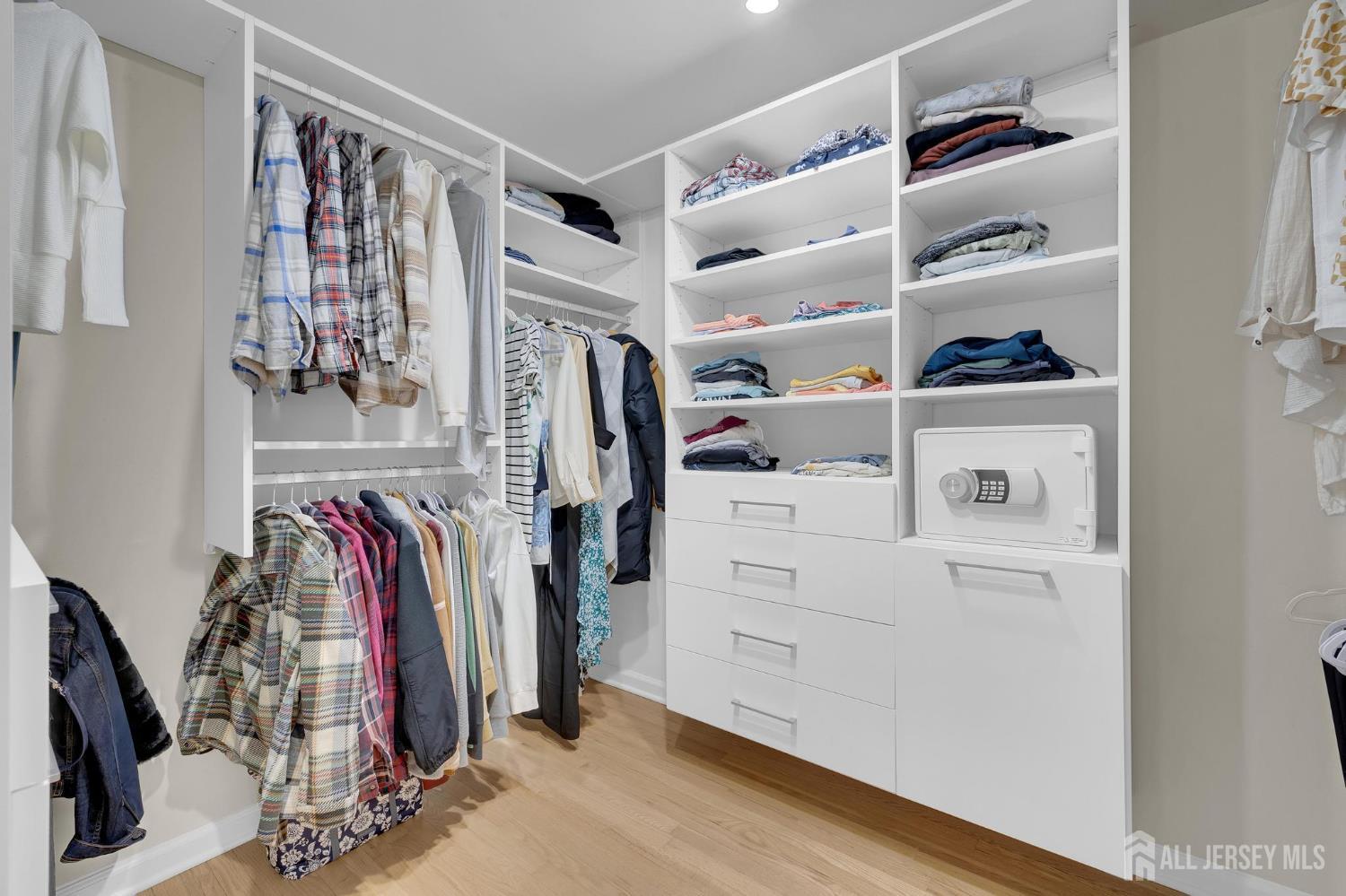 205 Hockenbury Road Hillsborough, NJ 08844 - Photo 18 of 38 a view of walk in closet with clothes and shoes