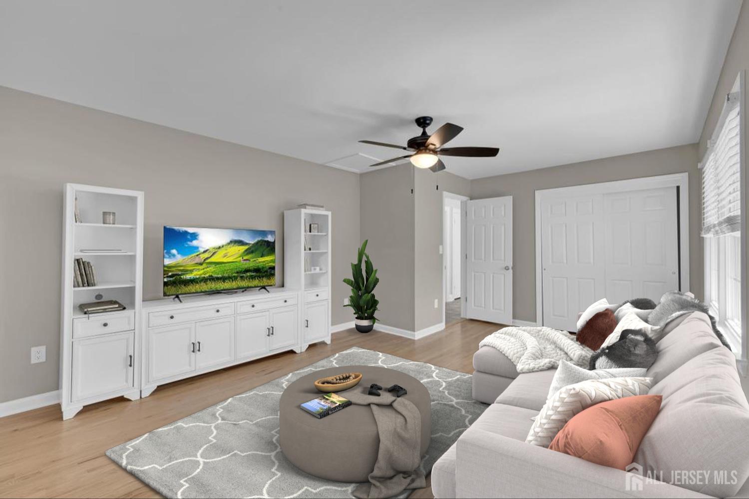 205 Hockenbury Road Hillsborough, NJ 08844 - Photo 21 of 38 a living room with furniture and a flat screen tv