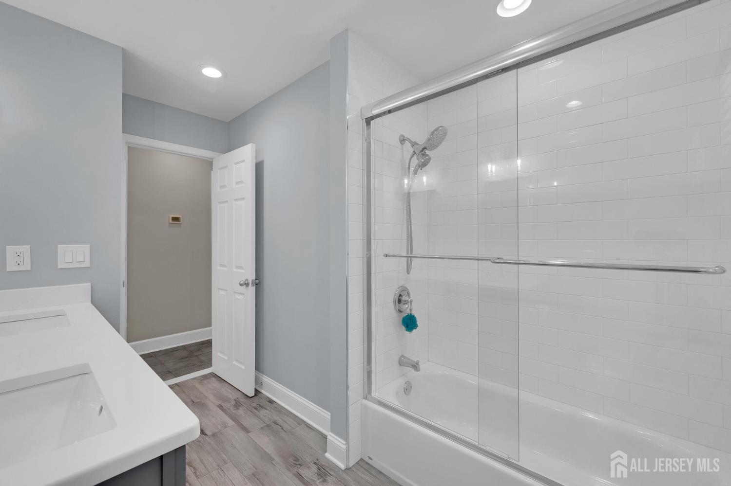 205 Hockenbury Road Hillsborough, NJ 08844 - Photo 26 of 38 a bathroom with a bathtub and a shower