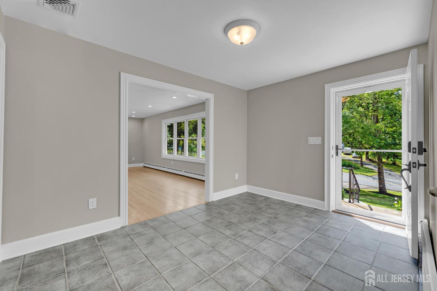 205 Hockenbury Road Hillsborough, NJ 08844 - Photo 5 of 38 an empty room with windows