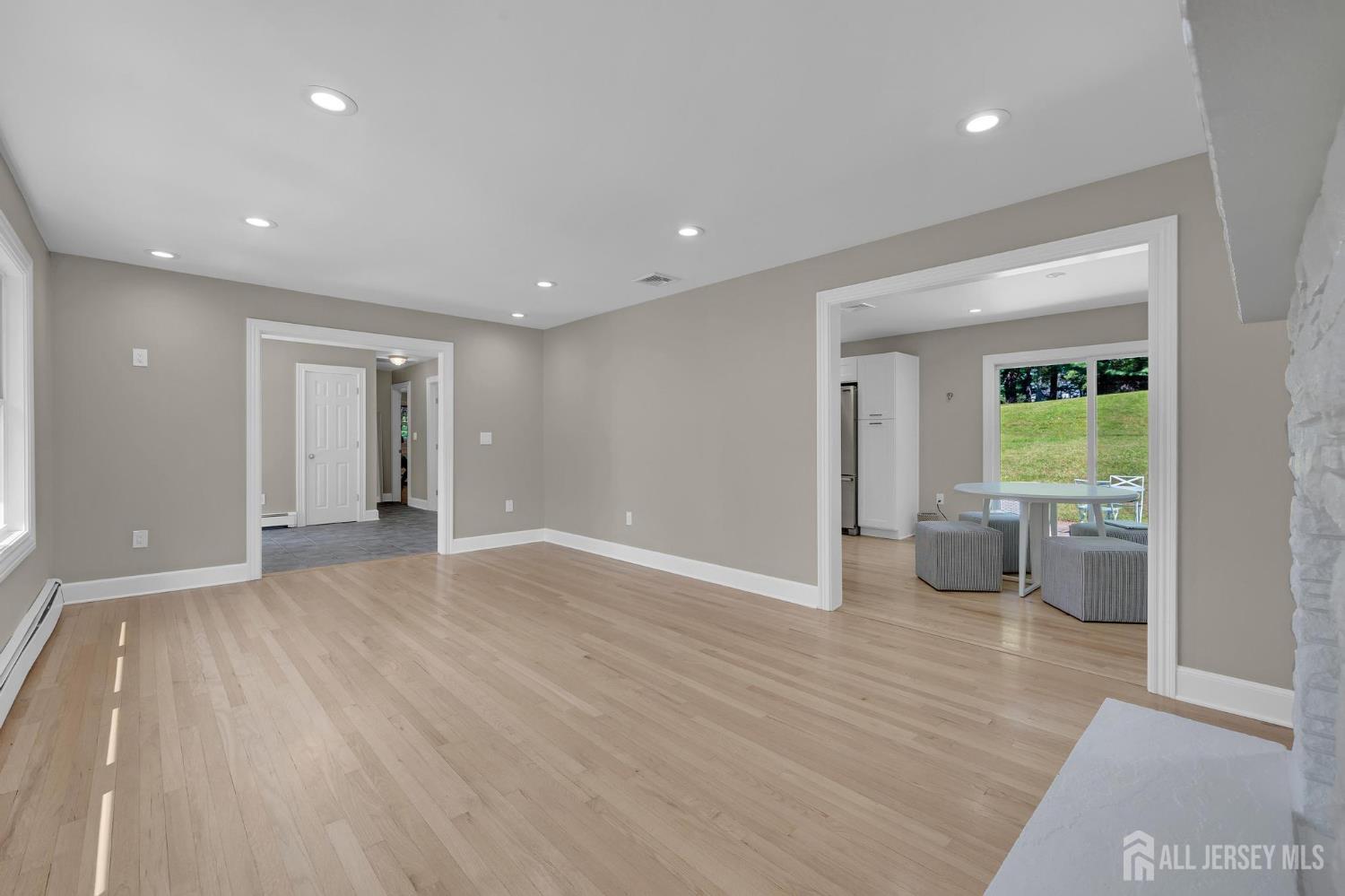 205 Hockenbury Road Hillsborough, NJ 08844 - Photo 10 of 38 a view of an empty room and glass door