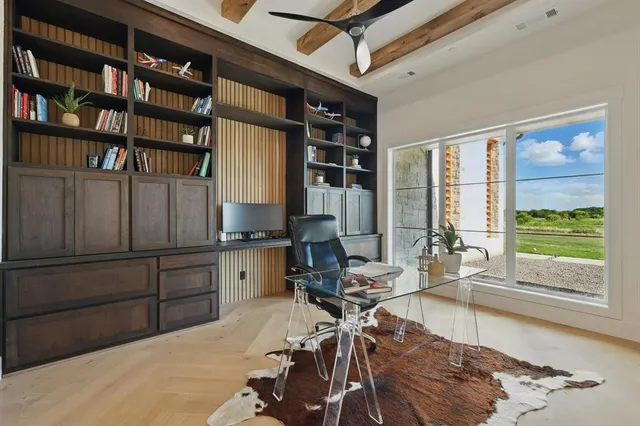 a bedroom with a bed couch and window