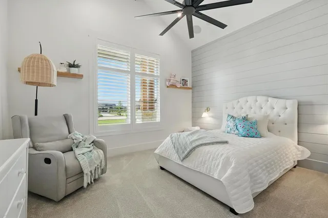 a en suite bathroom with a sink and a mirror