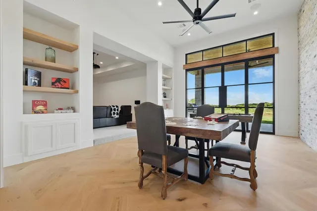 a view of a livingroom with furniture and window