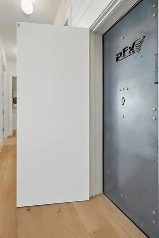 a view of an empty room with windows