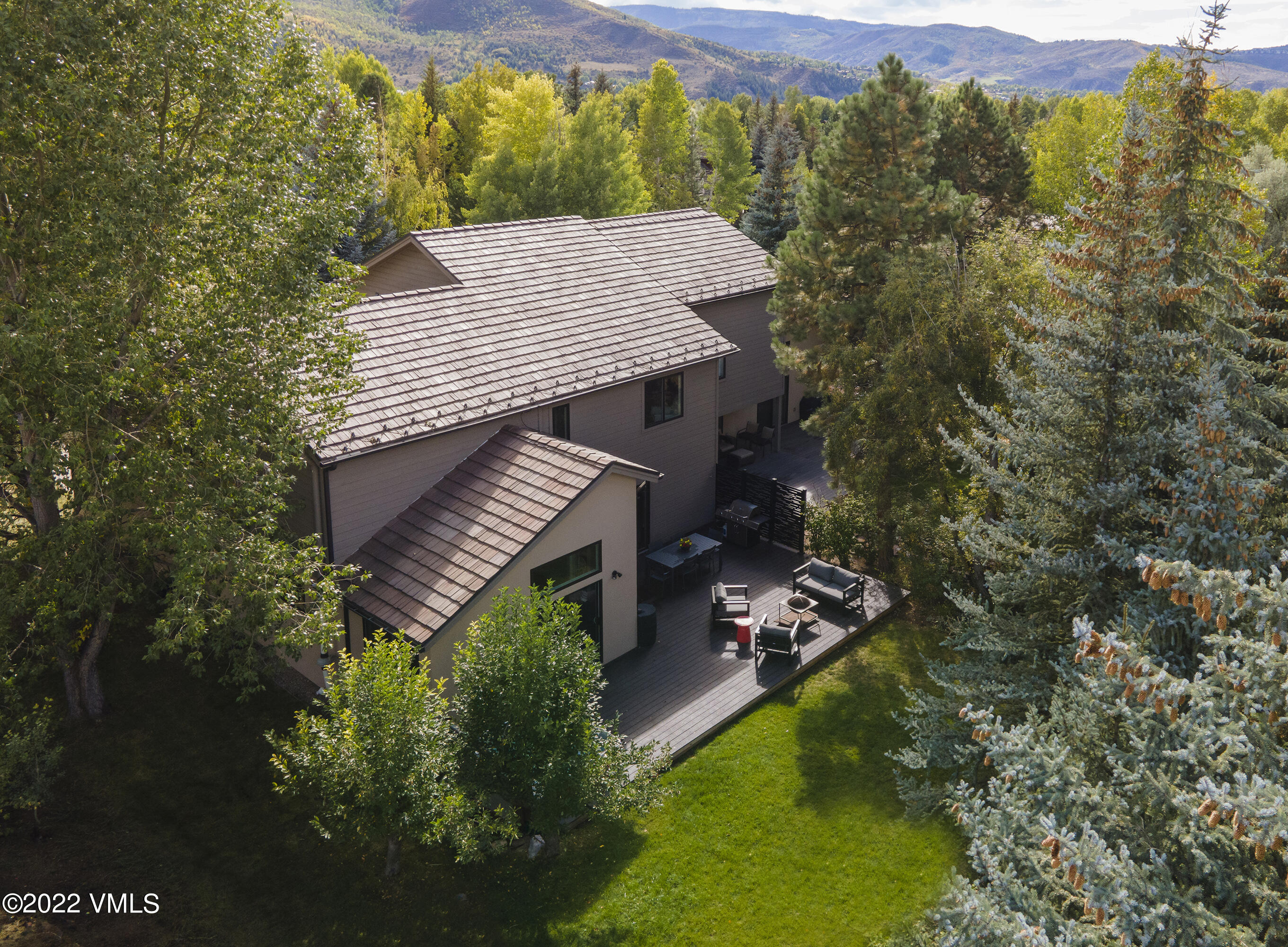 view of a house with a yard