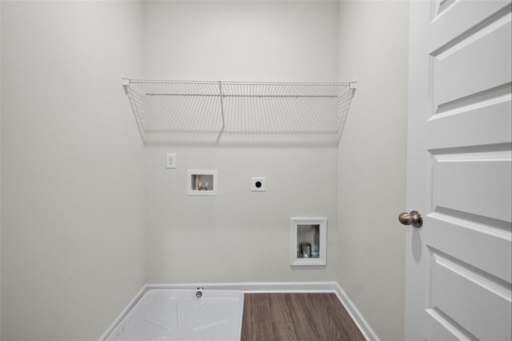 303 Roxeywood Way Winder, GA 30680 - Photo 37 of 47 a view of small space with racks on the wall