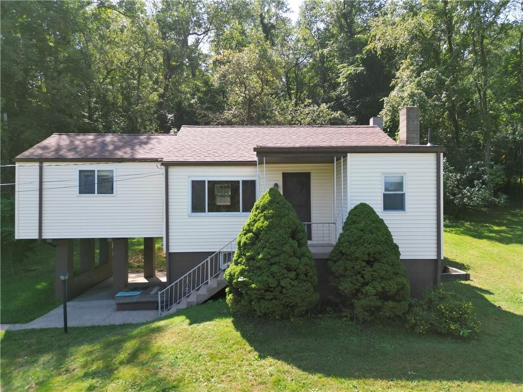 462 Crawford Run Road Cheswick, PA 15024 - Photo 3 of 39 a view of a house with backyard