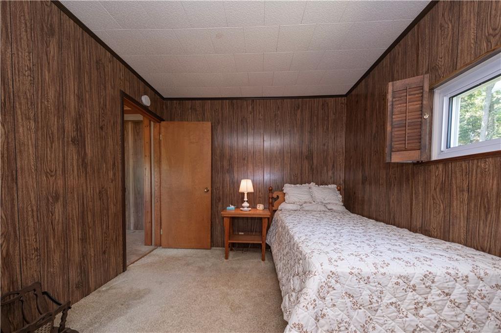 462 Crawford Run Road Cheswick, PA 15024 - Photo 32 of 39 a bedroom with a bed and a table