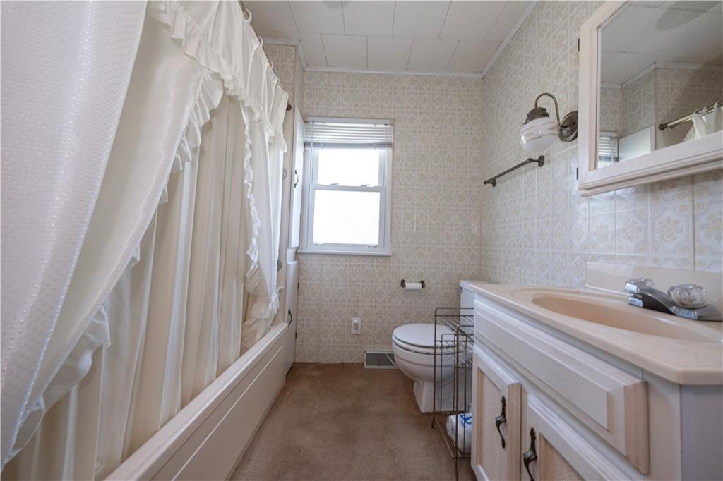 462 Crawford Run Road Cheswick, PA 15024 - Photo 33 of 39 a bathroom with a sink and a toilet