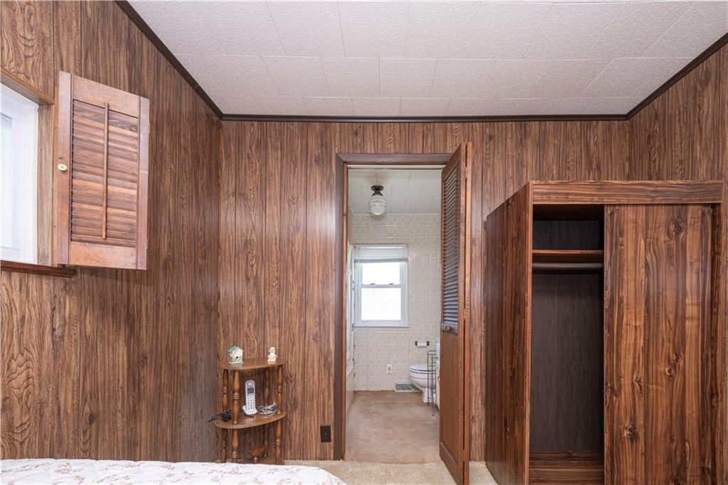 462 Crawford Run Road Cheswick, PA 15024 - Photo 34 of 39 a bathroom with a sink and a mirror