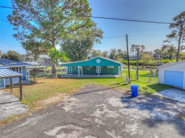 a view of pool with a back yard