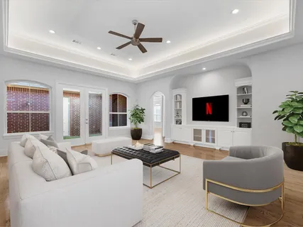 a living room with furniture and a flat screen tv