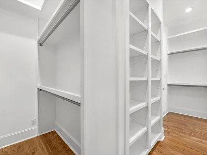 a view of an empty walk in closet