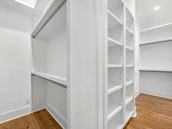 a view of an empty walk in closet