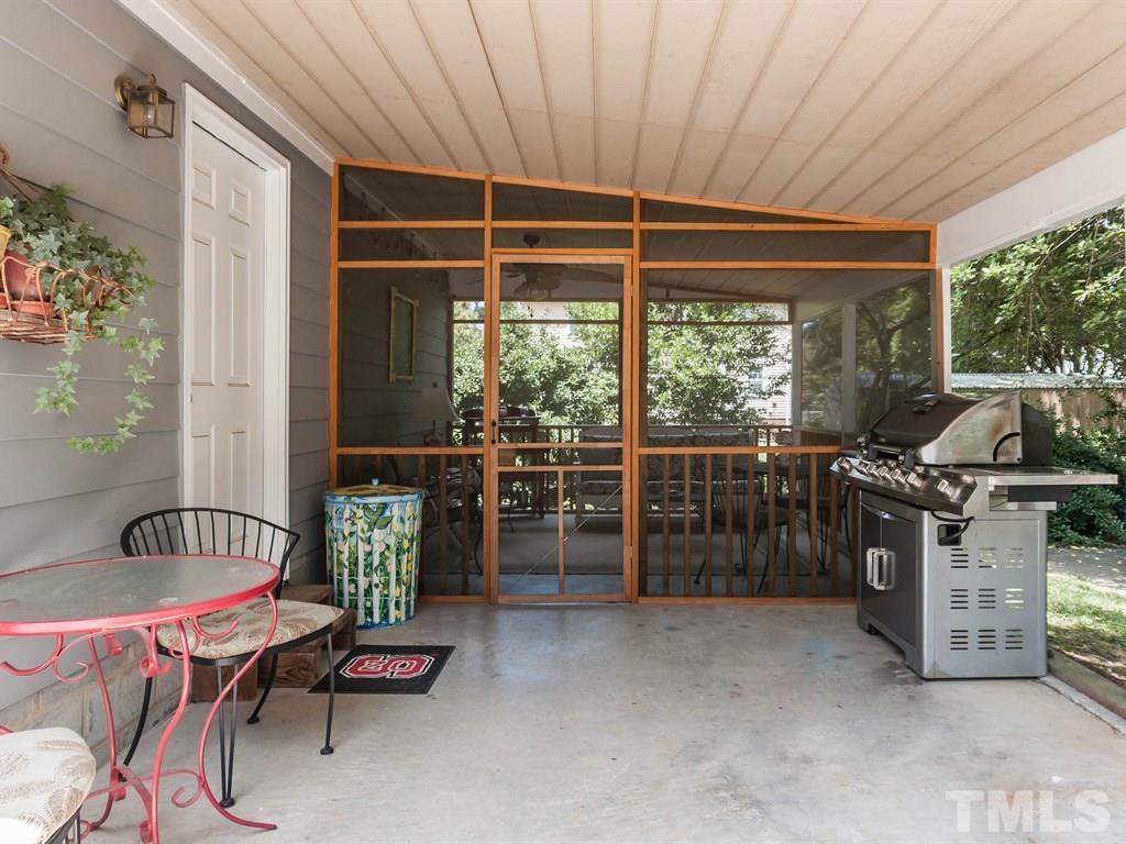 413 Crescent Court Raleigh, NC 27609 - Photo 24 of 25 a room with furniture and a window