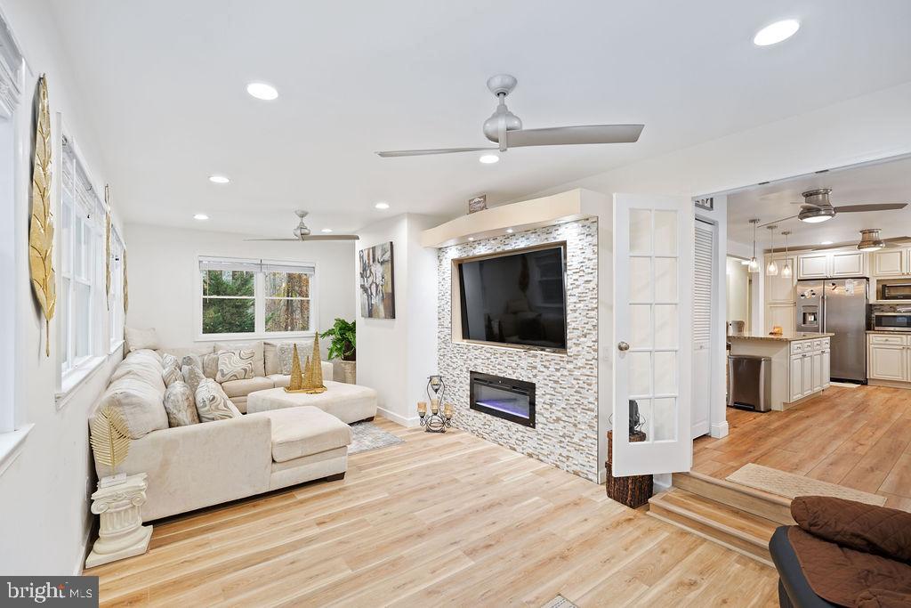 997 Mt Zion Marlboro Road Lothian, MD 20711 - Photo 22 of 58 a living room with furniture and a flat screen tv