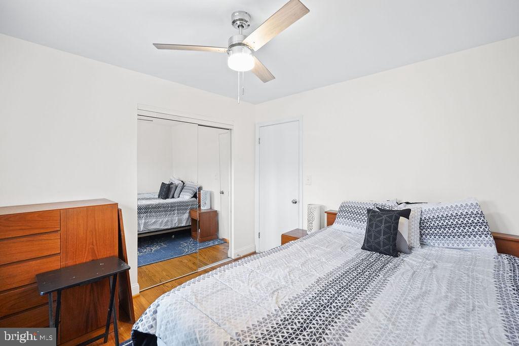 997 Mt Zion Marlboro Road Lothian, MD 20711 - Photo 32 of 58 a bedroom with a bed and wooden floor