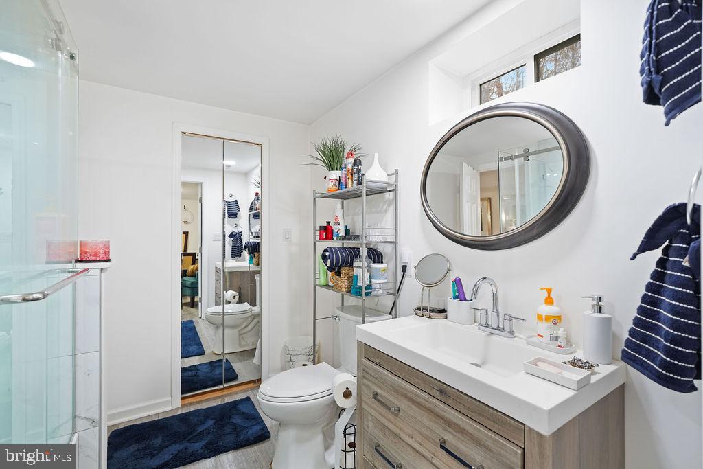 997 Mt Zion Marlboro Road Lothian, MD 20711 - Photo 43 of 58 a bathroom with a sink a toilet and a mirror