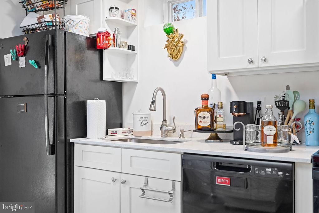 997 Mt Zion Marlboro Road Lothian, MD 20711 - Photo 48 of 58 a kitchen with appliances and cabinets