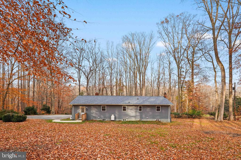 997 Mt Zion Marlboro Road Lothian, MD 20711 - Photo 54 of 58 a view of a house with a yard