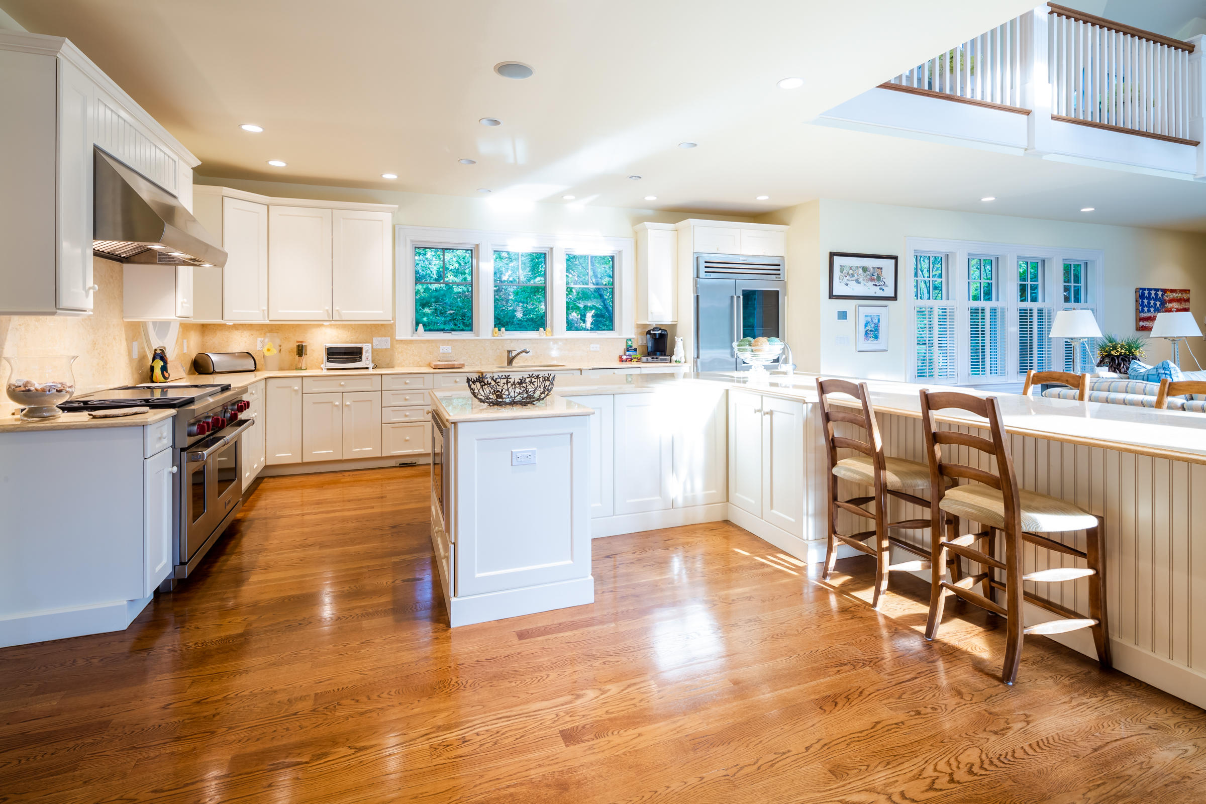 350 Windswept Way Osterville, MA 02655 - Photo 12 of 47 a large kitchen with cabinets table and chairs